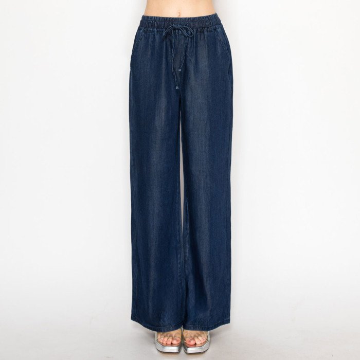 Pantalón de mezclilla con resorte y moño en color azul medio