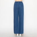 Pantalón de mezclilla con resorte y moño en color azul medio