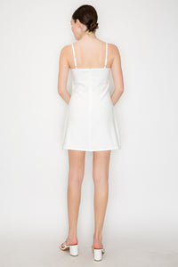 Vestido corto con tirantes y lazo decorativo