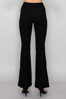 Pantalón acanalado de corte campana
