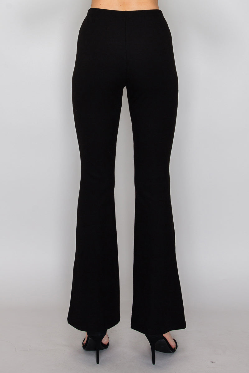 Pantalón acanalado de corte campana