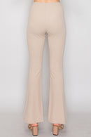 Pantalón acanalado de corte campana