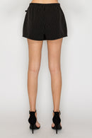 Falda short a rayas con lazo