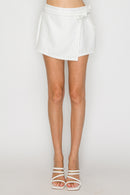 Falda short a rayas con lazo