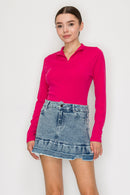 Blusa cuello alto con cierre frontal