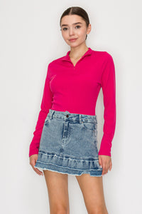 Blusa cuello alto con cierre frontal