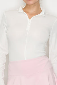 Blusa cuello alto con cierre frontal