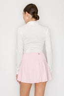 Blusa cuello alto con cierre frontal