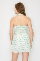Top halter con bordado floral