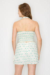 Top halter con bordado floral