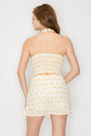 Top halter con bordado floral