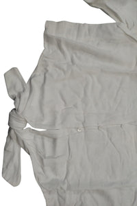 Blusa casual de lino con nudo frontal