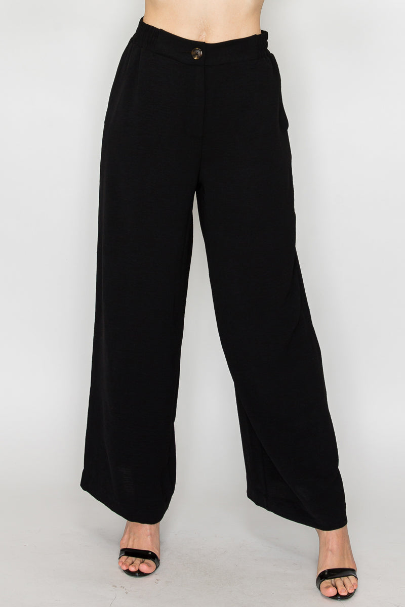 Pantalón negro de pierna ancha con resorte
