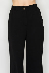 Pantalón negro de pierna ancha con resorte