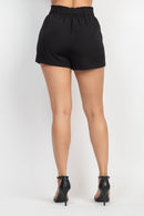 Short negro de vestir con moño en la cintura