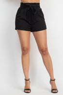 Short negro de vestir con moño en la cintura