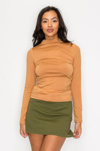 Blusa ajustada con cuello drapeado