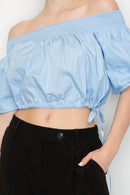 Blusa off shoulder crop