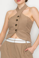 Chaleco cruzado sin mangas color taupe