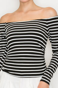 Blusa de punto con cuello alto y corte recto