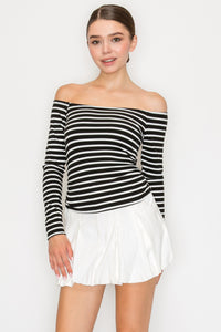 Blusa de punto con cuello alto y corte recto