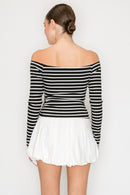 Blusa de punto con cuello alto y corte recto