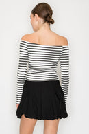 Blusa de punto con cuello alto y corte recto