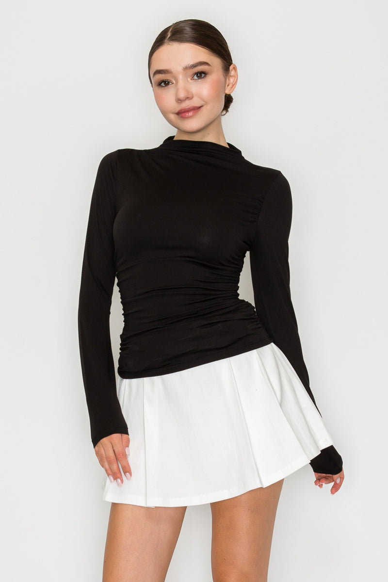 Blusa cuello alto drapeado manga larga