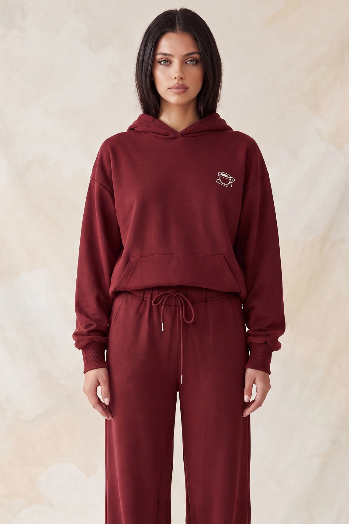 Sudadera con capucha y bordado de taza