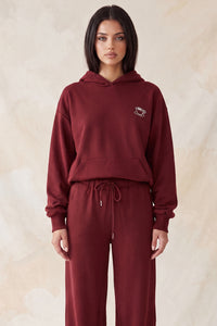 Sudadera con capucha y bordado de taza
