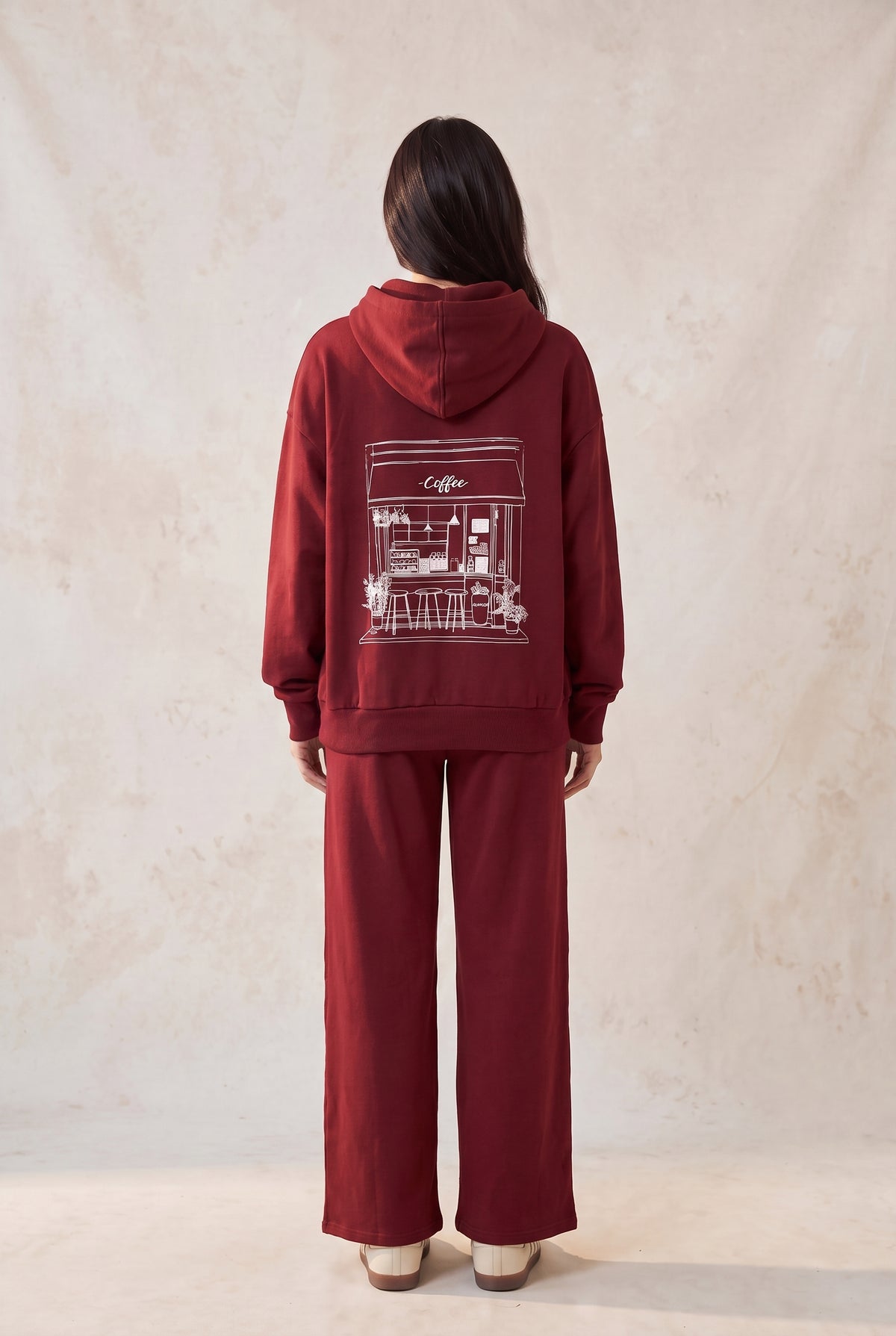 Sudadera con capucha y bordado de taza
