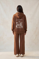 Sudadera con capucha y bordado de taza