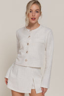 Saco corto con botones decorativos y textura tipo tweed