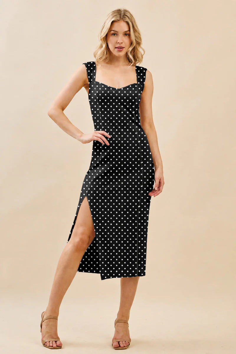 Vestido midi de lunares con abertura lateral