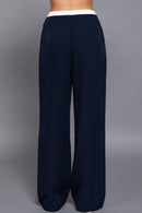 pantalón palazzo azul con pretina blanca