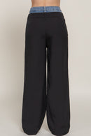 Pantalón negro ancho con cintura de mezclilla