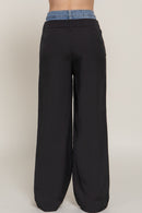 Pantalón beige con cintura de mezclilla