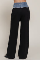 Pantalón gris con pretina de mezclilla deshilachada