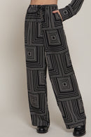 Pantalón amplio con estampado geométrico en blanco y negro