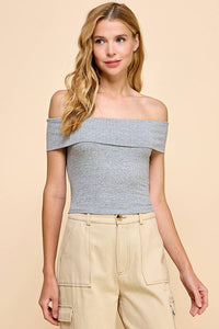 Blusa off shoulder de punto