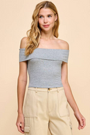 Blusa off shoulder de punto