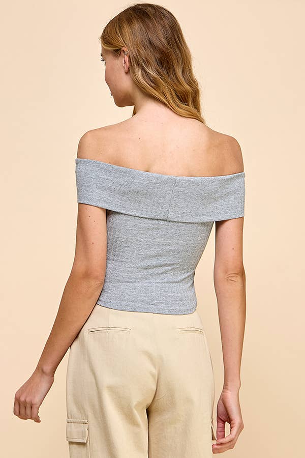 Blusa off shoulder de punto