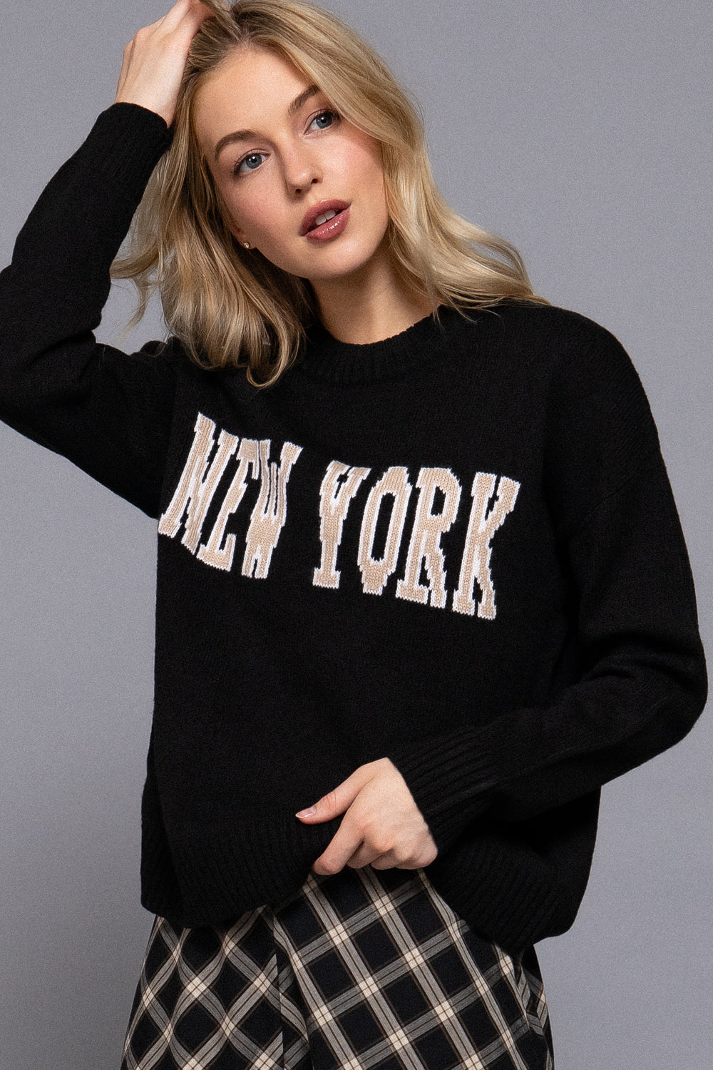 Suéter negro new york