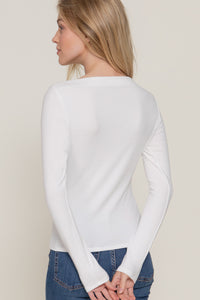 Blusa básica cuello barco