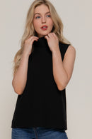 Blusa sin mangas cuello alto acanalada