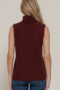 Blusa sin mangas cuello alto acanalada