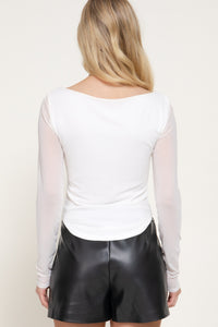 Blusa cuello barco con mangas de malla