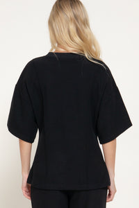 Blusa oversize manga corta